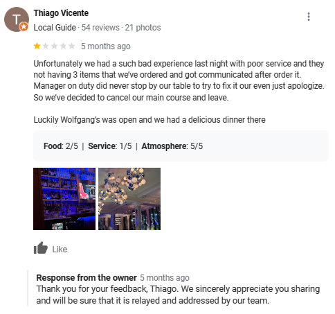 A 1-star Google review with an owner response.