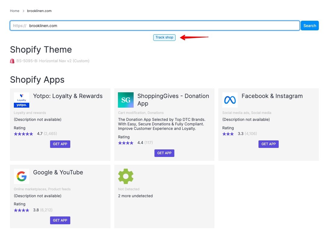 The &lsquo;track shop link is center aligned, directly under the search bar at the top of the page.